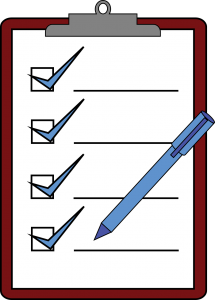 a pen and a checklist on a clipboard