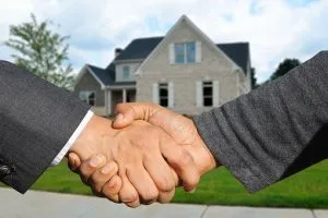 Shaking hands is the sign that you have a deal with the owner of your rental home