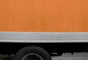 Orange moving truck - the sign that our Florida City movers are on the job.