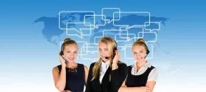 Three women from a call center with a blue background