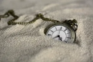 A watch in the sand.