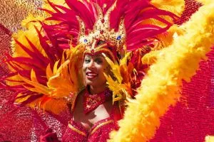 A woman dressed for a carnival.