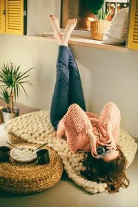 Increase the comfort of your home - woman on the blanket taking picture upside down