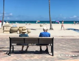 elderly couple on the beach