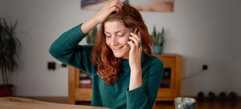 A woman making a phone call.
