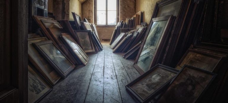Paintings stored in dirty attic