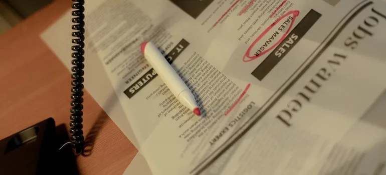 newspaper and a pen 