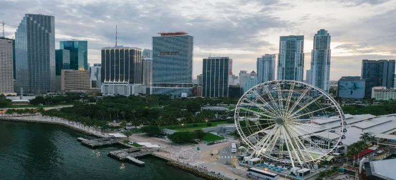 High Rise Buildings and Ferris Wheel in Miami as one of the top South Florida neighborhoods for families