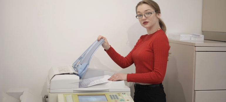 A woman scanning documents.